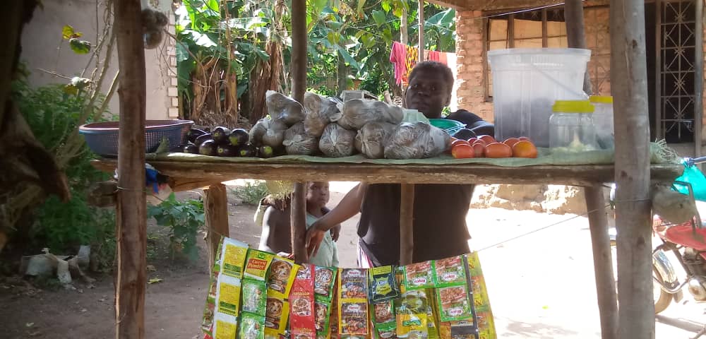 old woman working on her small business empowered my kin